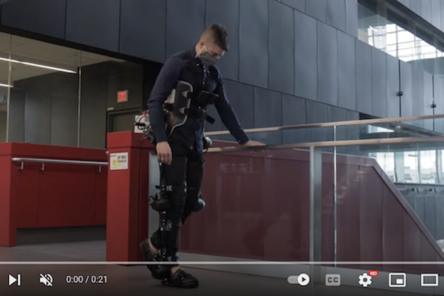 Dr. Brokoslaw Laschowski walking with a robotic exoskeleton.
